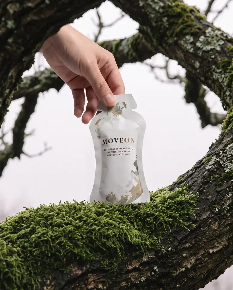 A hand holding a MoveOn sachet